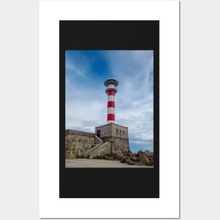 Lighthouse by the sea Posters and Art